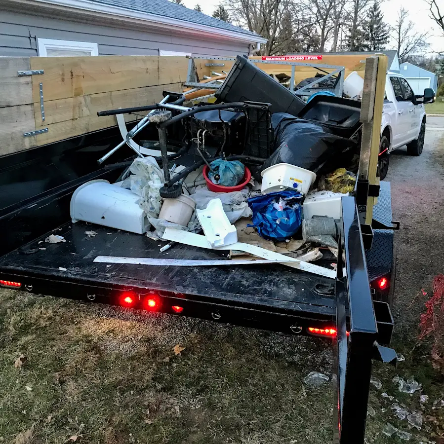 Roll-off dumpster delivered to a residential driveway in Belmont
